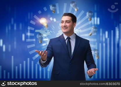 Businessman juggling lightbulbs in new idea concept