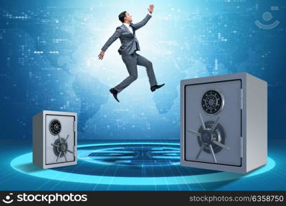 Businessman jumping from safes in business concept