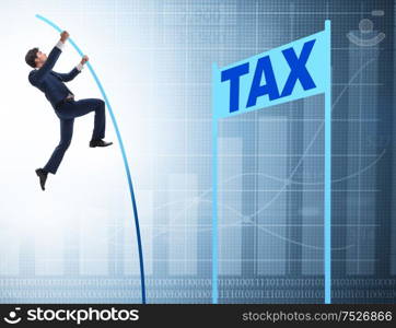 Businessman jumping over tax in tax evasion avoidance concept. The businessman jumping over tax in tax evasion avoidance concep