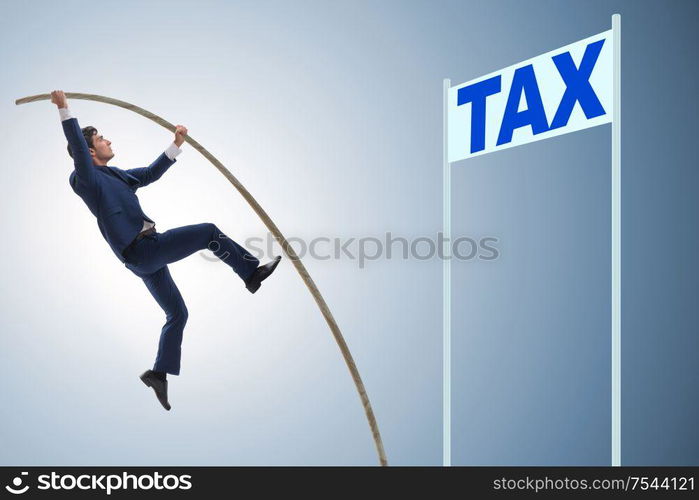 Businessman jumping over tax in tax evasion avoidance concept. The businessman jumping over tax in tax evasion avoidance concep