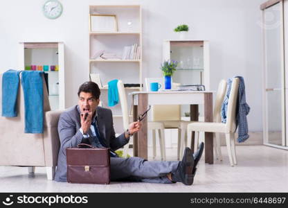 Businessman late for office due to oversleeping after overnight working. Businessman late for office due to oversleeping after overnight