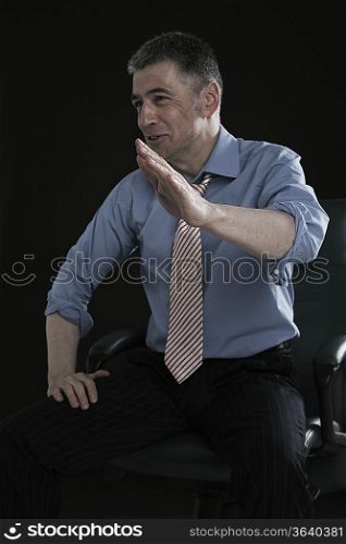 Businessman Laughing and Gesturing
