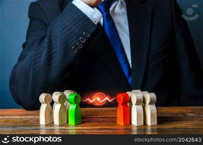 Businessman leader is thinking about resolving conflict of people groups. Rivalry and competition. Resolution, compromise through negotiations. Reconciliation and Consolidation. Mediator, mediation.