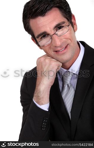 businessman leaning his head on his fist