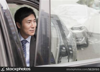 Businessman Leaving Car