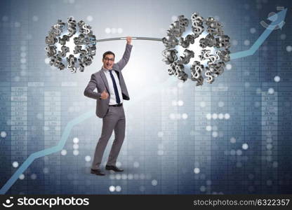 Businessman lifting barbell with dollars