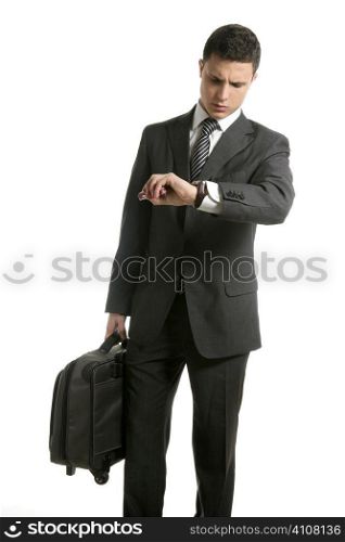 Businessman look his watch with handbag isolated on white