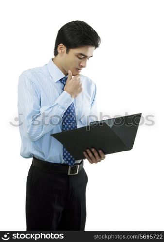 Businessman looking at a file