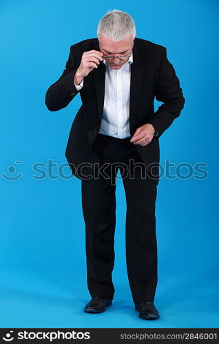 Businessman looking down