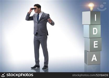 Businessman looking for bright ideas