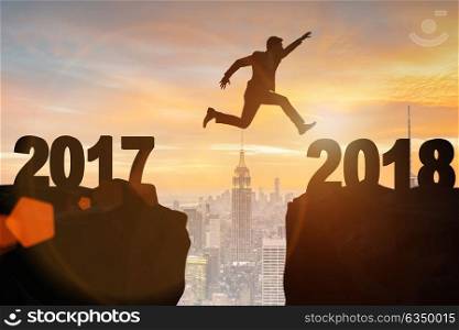 Businessman looking forward to 2018 from 2017