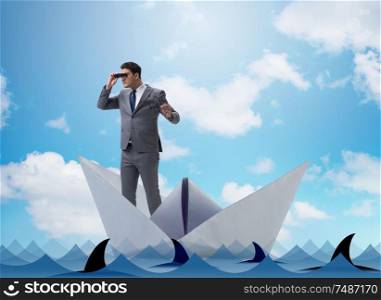 Businessman looking into future with binoculars in paper ship boat. Businessman looking into future with binoculars in paper ship bo