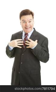 "Businessman looking surprised and pointing to himself as if to say "who me?" Isolated on white. "