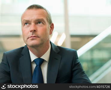 Businessman looking up