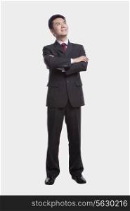 Businessman Looking Up, Full Length