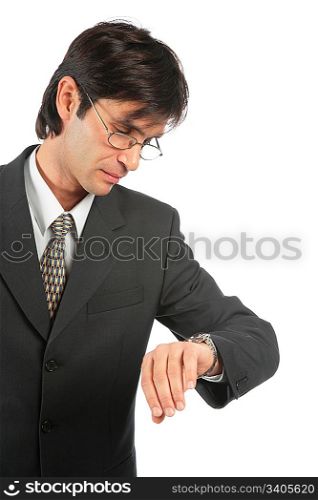 businessman looks at watch