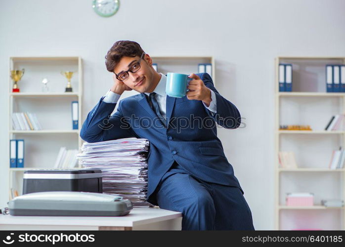 Businessman making copies in copying machine