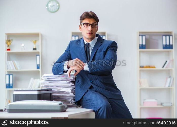 Businessman making copies in copying machine