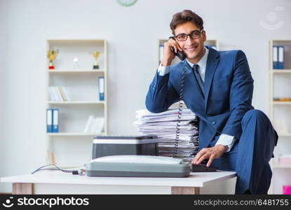 Businessman making copies in copying machine