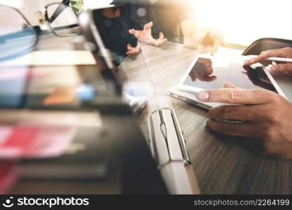 Businessman making presentation with his colleagues and business tablet digital computer at the office as concept