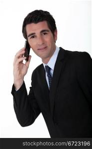 Businessman making telephone call