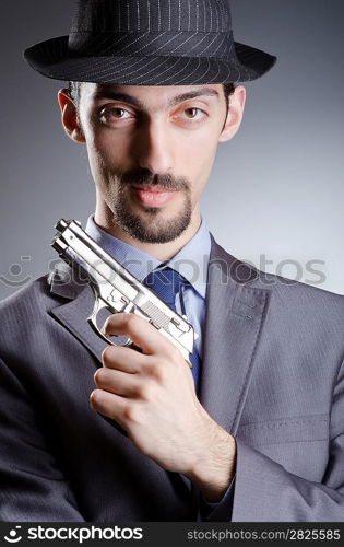 Businessman man with hand gun