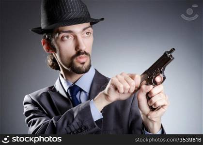 Businessman man with hand gun