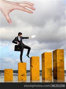 Businessman marionette on ropes controlled by puppeteer walking on bars