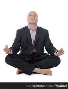businessman meditating in yoga lotus. Isolated on white background
