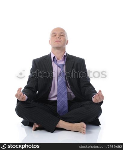 businessman meditating in yoga lotus. Isolated on white background