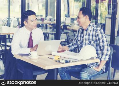 Businessman meeting at coffee shop. Team project conference. Construction concept.