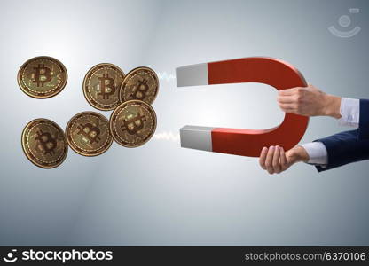 Businessman mining bitcoins with horseshoe magnet