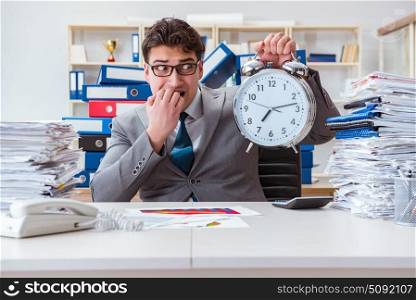 Businessman missing deadlines due to excessive work