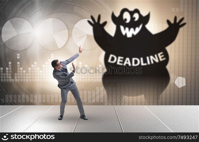 Businessman missing important deadline with the monster. Businessman missing important deadline with monster