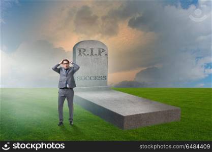 Businessman mourning the death of success