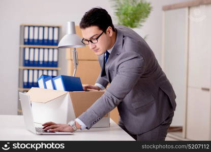 Businessman moving offices after promotion