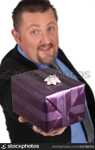 Businessman offering gift