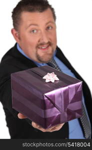 Businessman offering gift