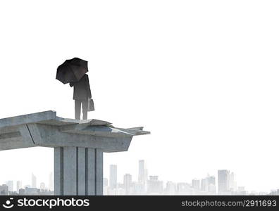 Businessman on bridge