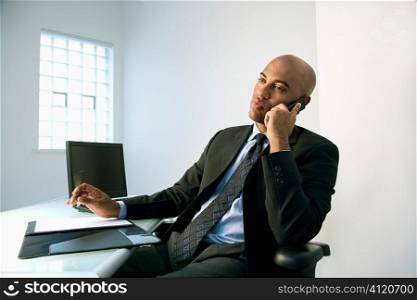 Businessman on cellphone.