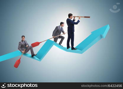 Businessman on line chart in business concept