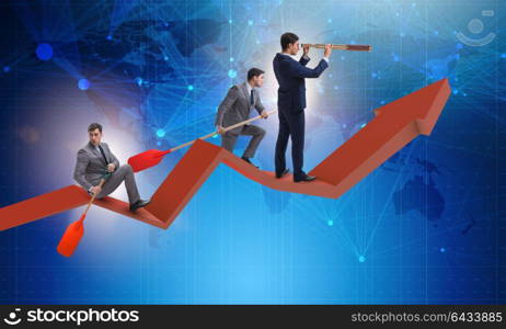 Businessman on line chart in business concept