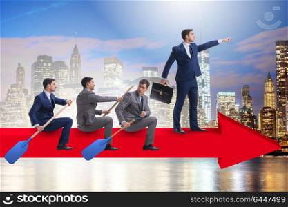 Businessman on line chart in business concept