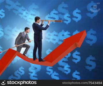 Businessman on line chart in business concept. The businessman on line chart in business concept