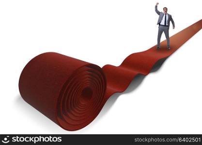 Businessman on red carpet isolated white background