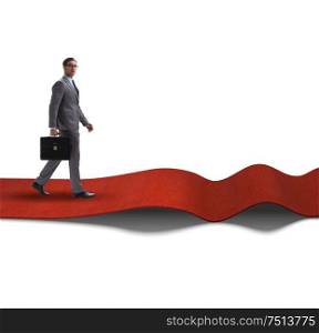 Businessman on red carpet isolated white background. The businessman on red carpet isolated white background