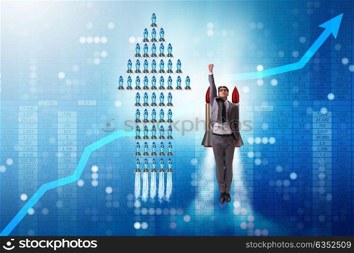 Businessman on rocket in trading concept