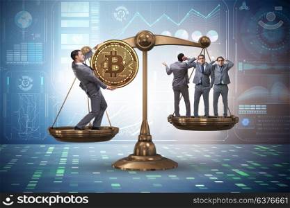 Businessman on scales with bitcoins and other businessmen
