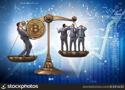 Businessman on scales with bitcoins and other businessmen