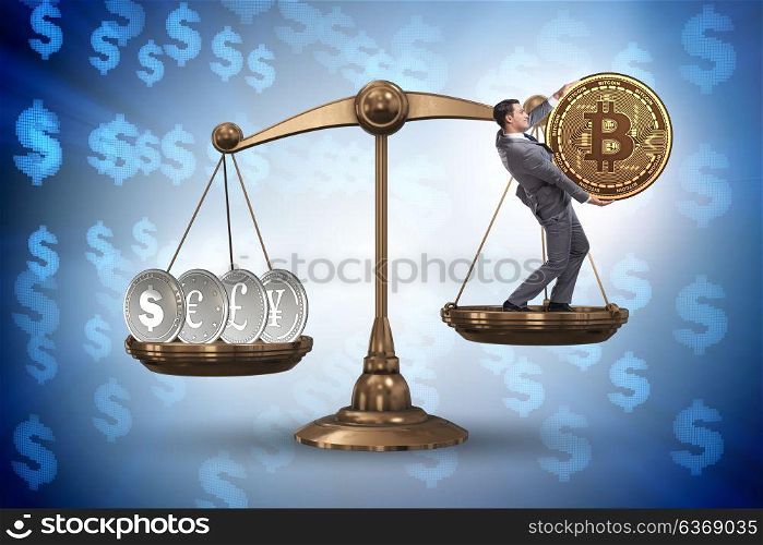 Businessman on scales with bitcoins and other currencies